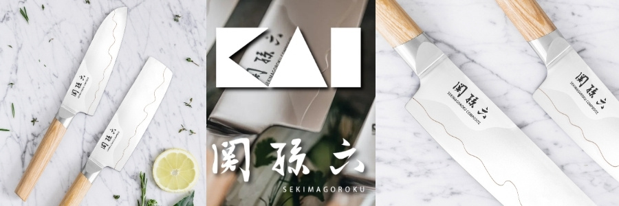 KAI Seki Magoroku Kochmesser mit hellen Holzgriffen und geschweißten Klingen